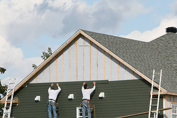 Professional Siding technician working in Olney, MD